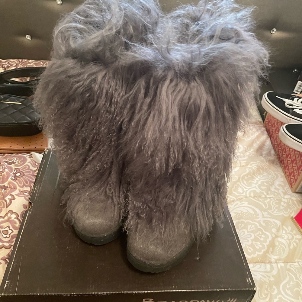 Stylish grey furry bear paws boots